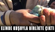 Elinde kuşuyla birlikte çıktı