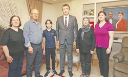 Erhan Güzel'den şehit ailelerine ziyaret