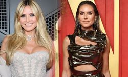 Heidi Klum Oscar elbisesiyle trambolinde zıpladı!