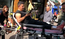 İskeleden düşüp yaralandı! Sedyede bile telefonu bırakmadı