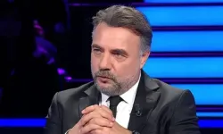 Kim Milyoner Olmak İster'in sunucusu Oktay Kaynarca plajda genç güzelle görüntülendi!