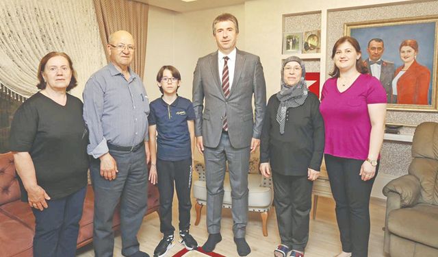 Erhan Güzel'den şehit ailelerine ziyaret