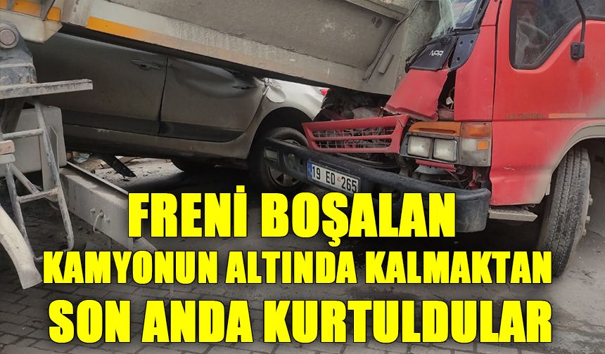 Freni boşalan kamyonun altında kalmaktan son anda kurtuldular